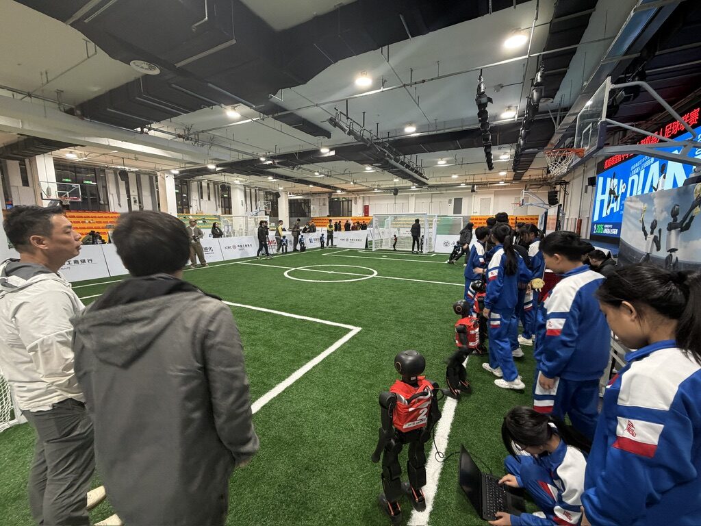 Watching a match from the touchline